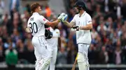 England's Ollie Pope celebrates with teammate Harry Brook after reaching his century during Day 1 of the 3rd Test against Sri Lanka at The Kia Oval on September 6. (Getty)