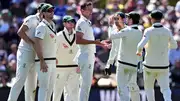 Australian players celebrate with each other Josh Hazlewood took a wicket in this frame. (Getty)