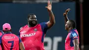 Rahkeem Cornwall celebrates a wicket with captain Rovman Powell (Getty Images)